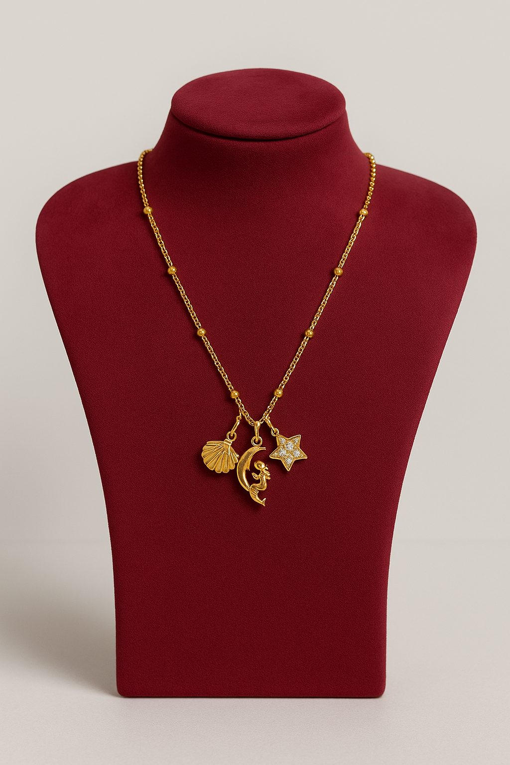 Gold Charm Necklace for Women – Celestial & Shell Motifs | Pratiru